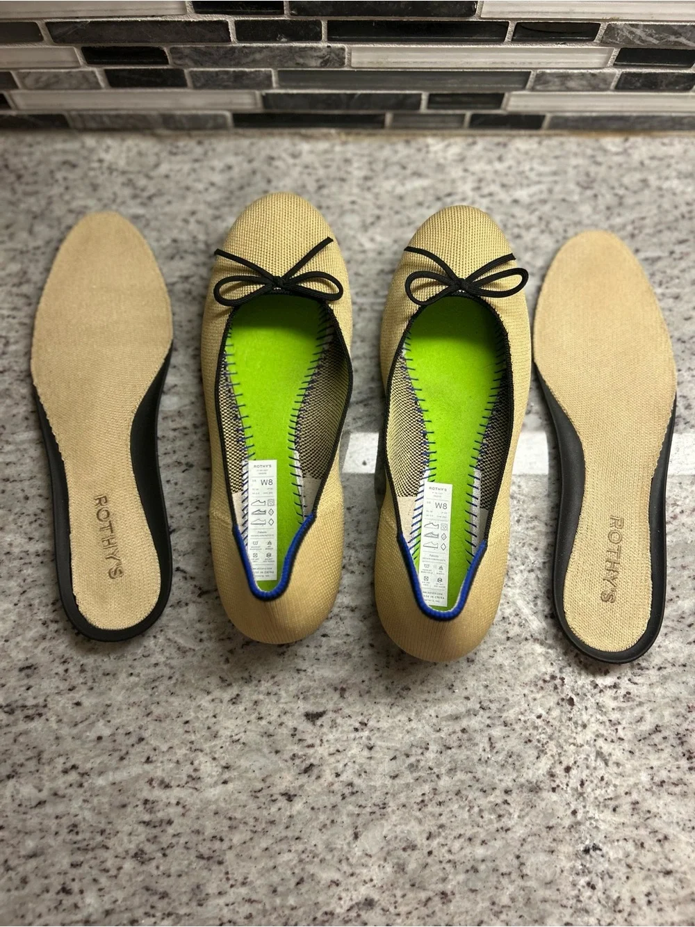 Rothy's Tan/cream Ballet Flats with Black Bow Trim and Blue Piping size 8